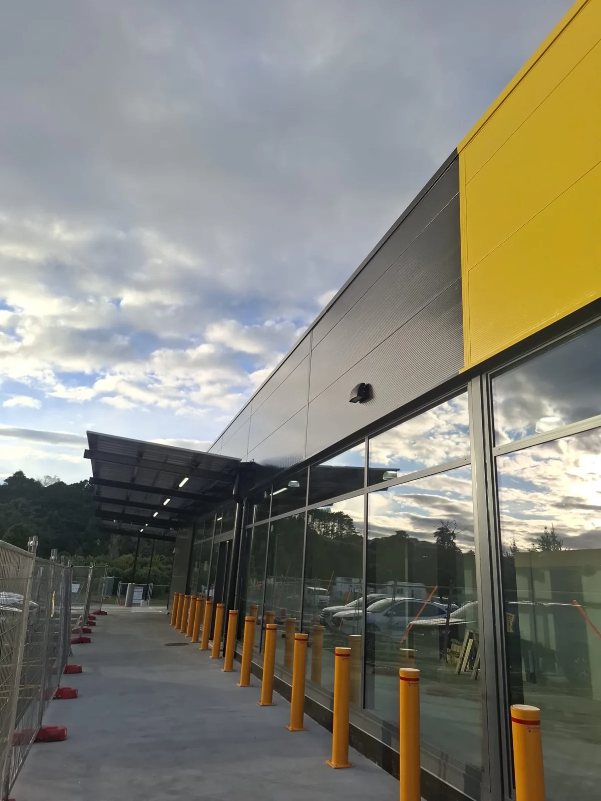 Completed grey and yellow commercial exterior