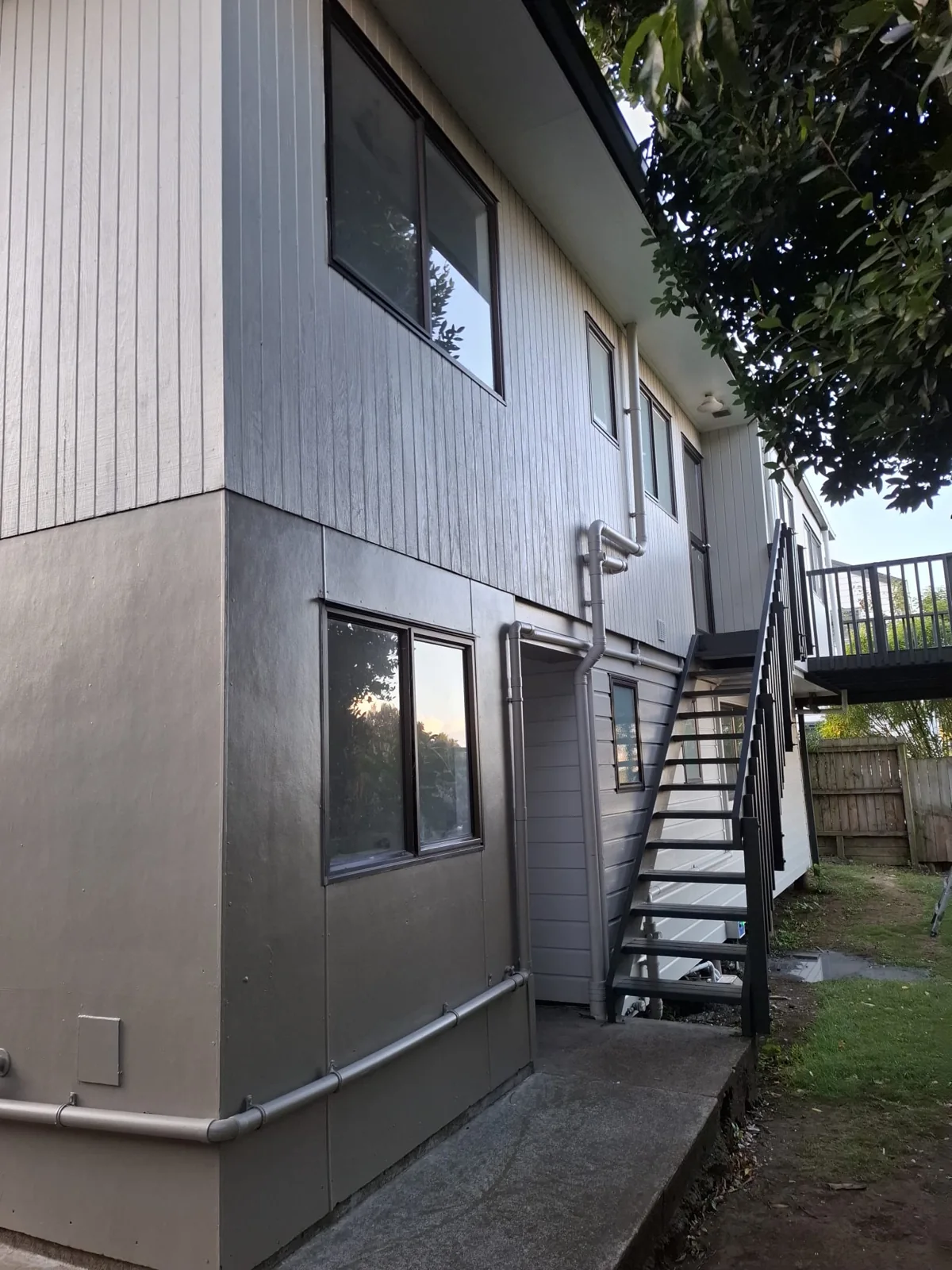Two-storey home with refreshed exterior cladding