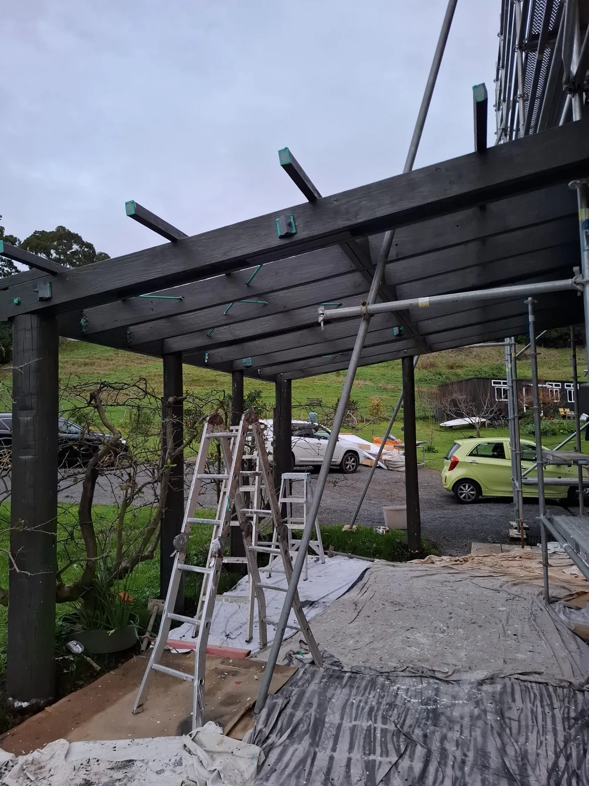 Timber canopy repaint in progress