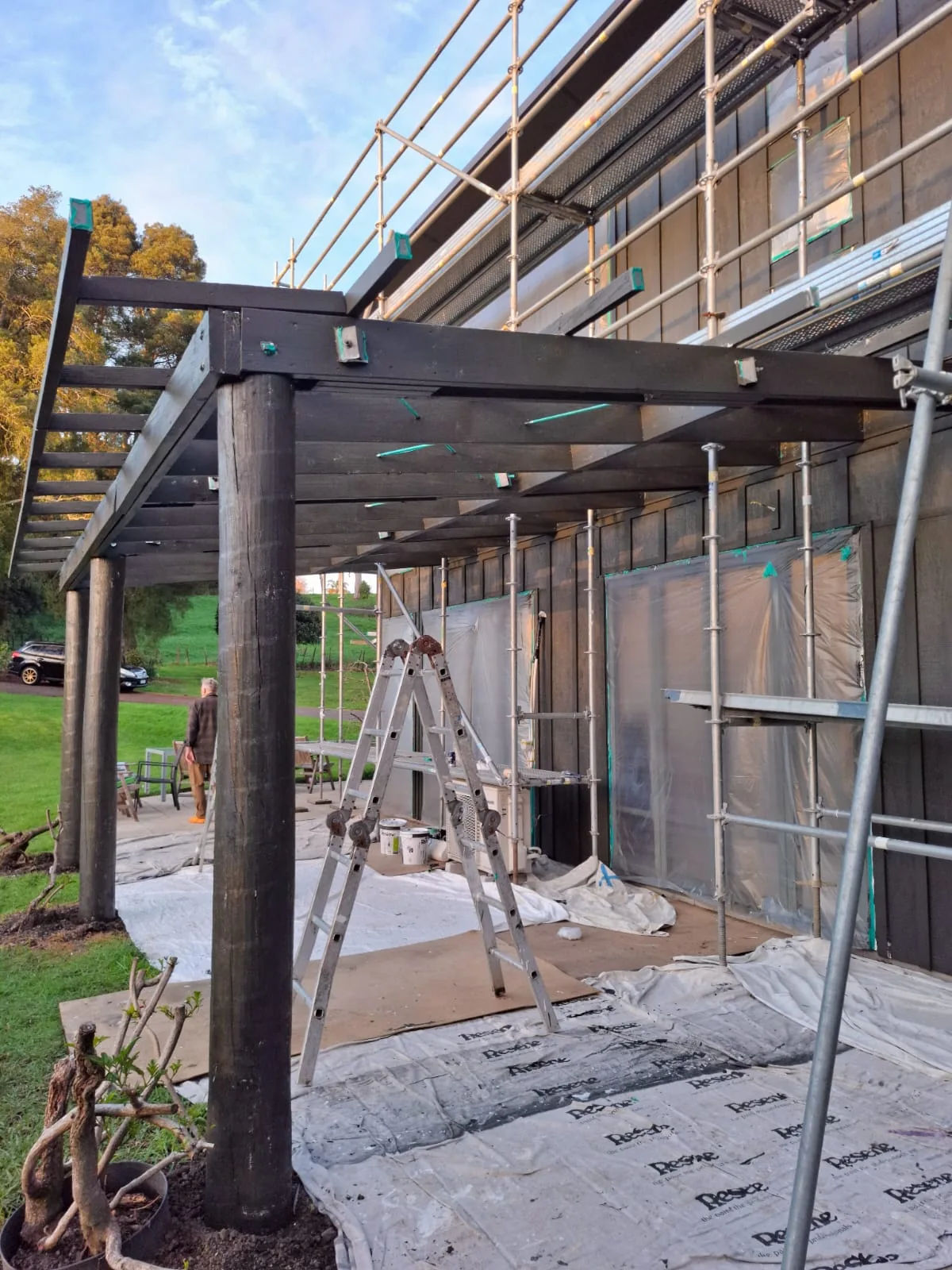 Large exterior timber structure prepared for painting
